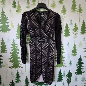 Privately Privilaged Black And Nude Mini Dress.